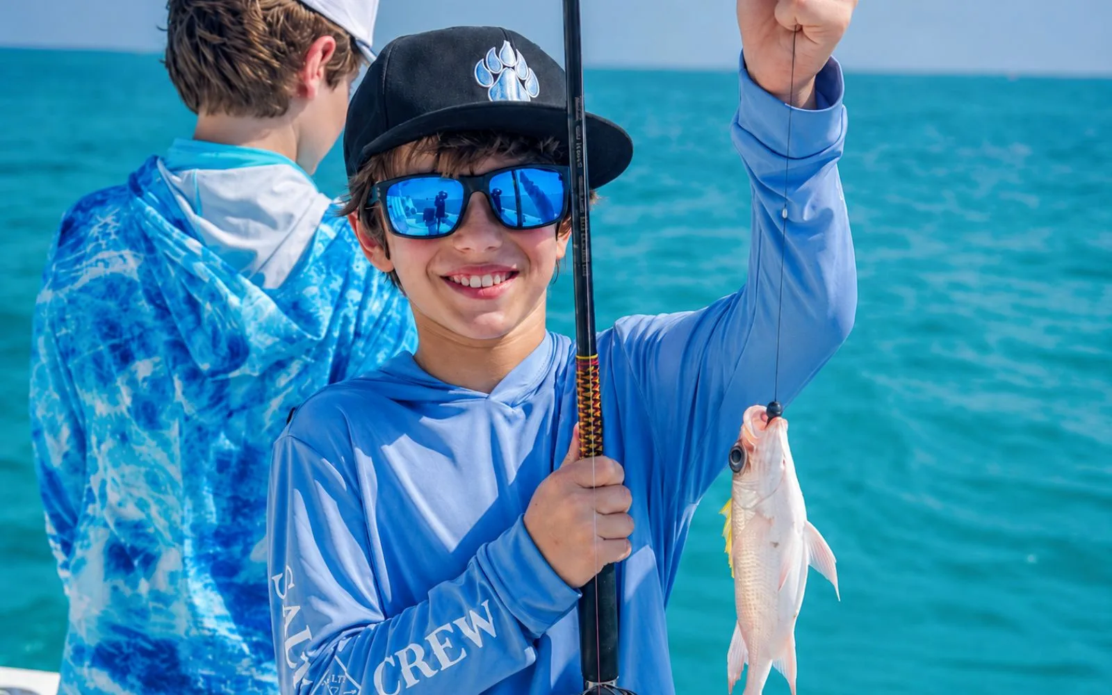 Family Reef Fishing & Stingray City Boat Charter in Grand Cayman